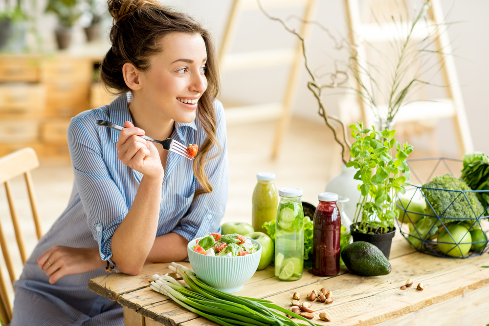 Healthy Woman eating salad